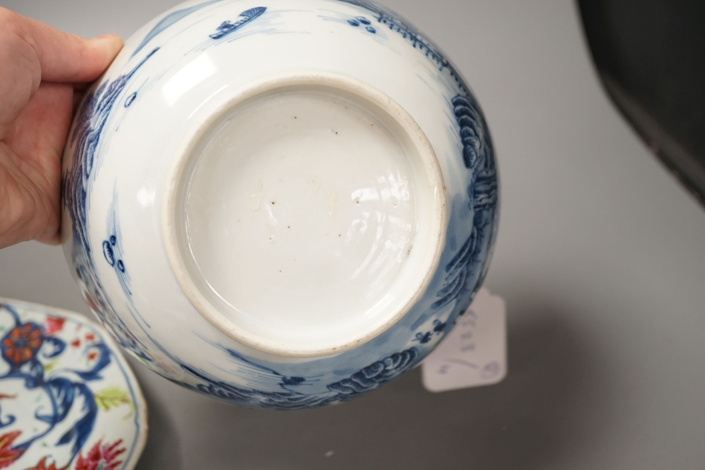 An 18th century Chinese famille rose ‘birds and lotus’ plate, and a Chinese blue and white ‘landscape’ bowl, 17.6cm